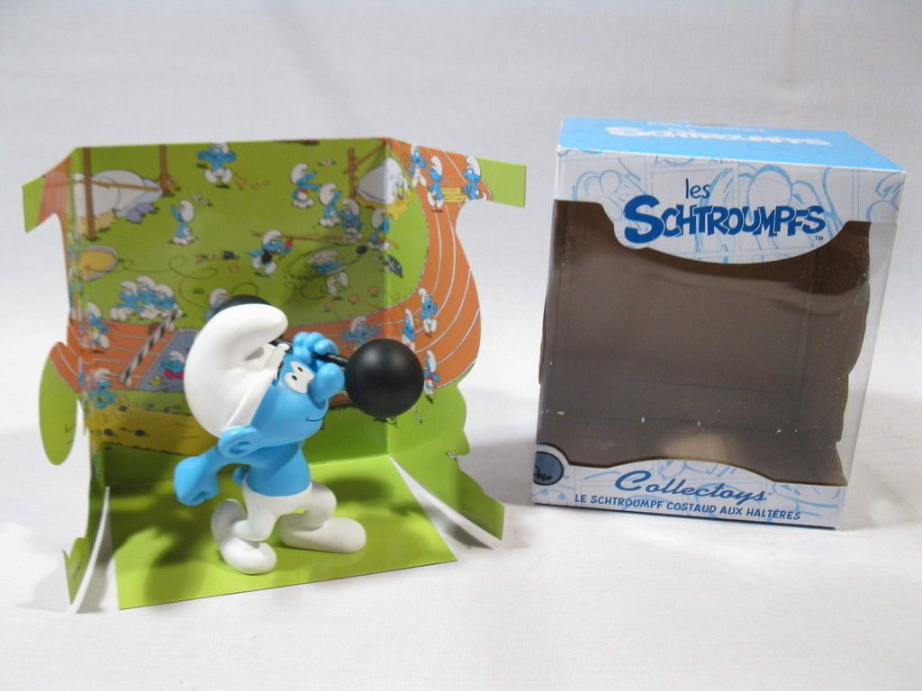 Kunstharz Schlumpf mit Hantel  Fa. Plastoy  resin smurf  schtroumpf puffi  p169